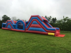 Red & Blue 60Ft Donegal Bouncy Castle Hire